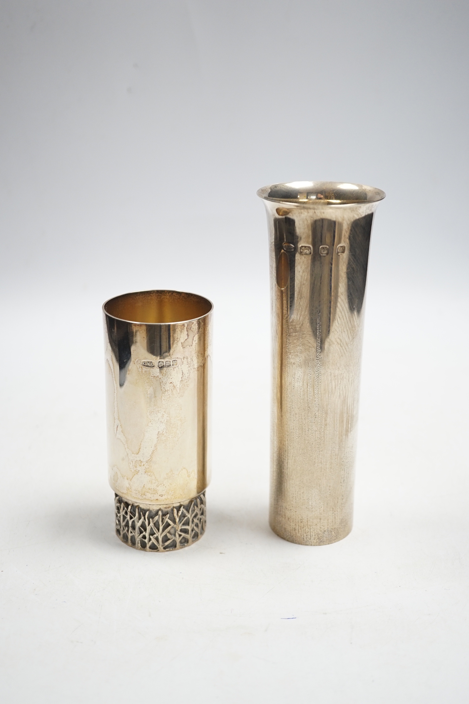 Two Elizabeth II silver cylinder vases, by Christopher Nigel Lawrence, including antler range vase, with certificate, 12.3cm, Edinburgh, 1970, the taller vase, London, 1970, 15.6oz.